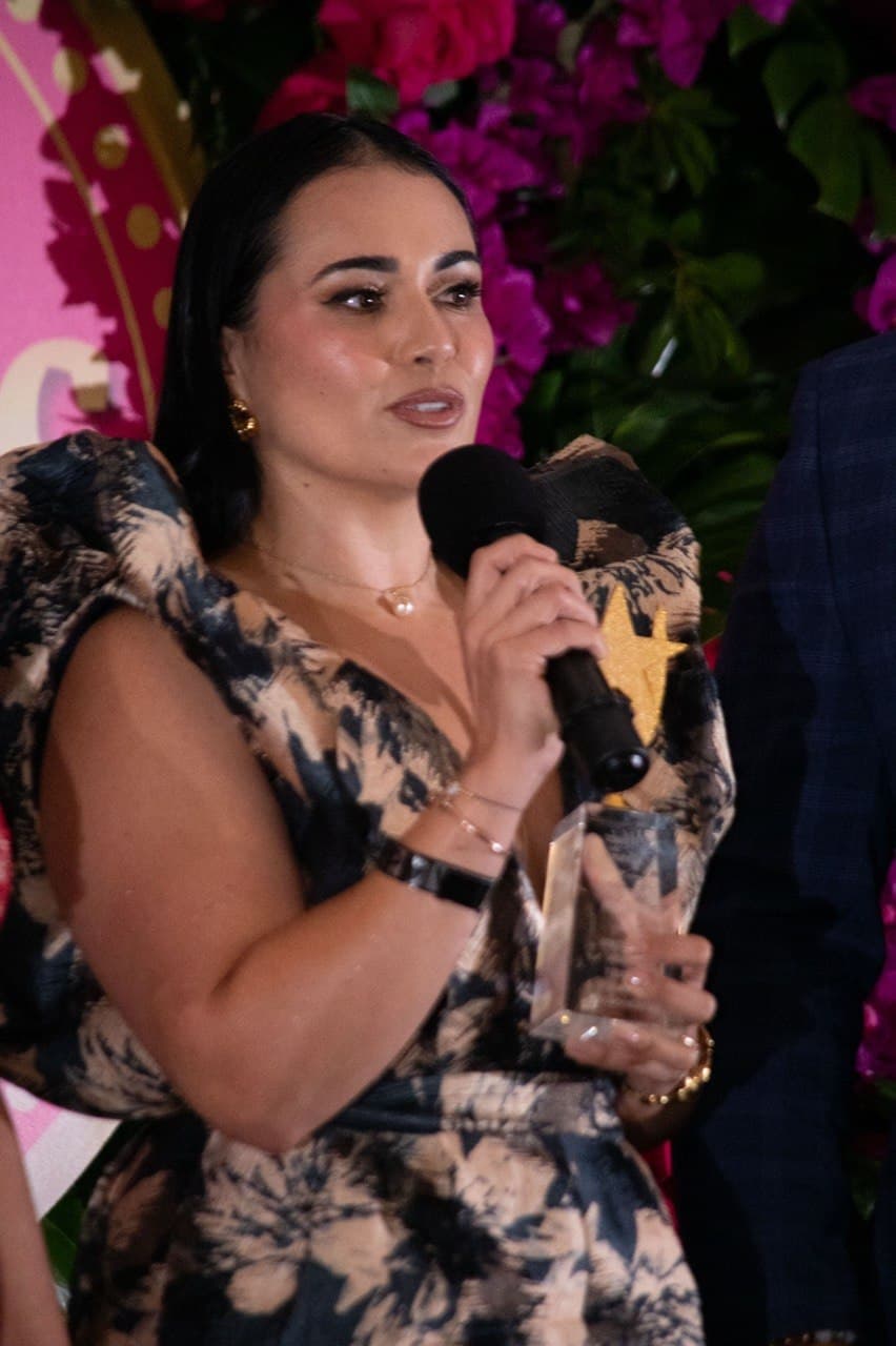 Dr. Gissele Donovan — on stage receiving recognition