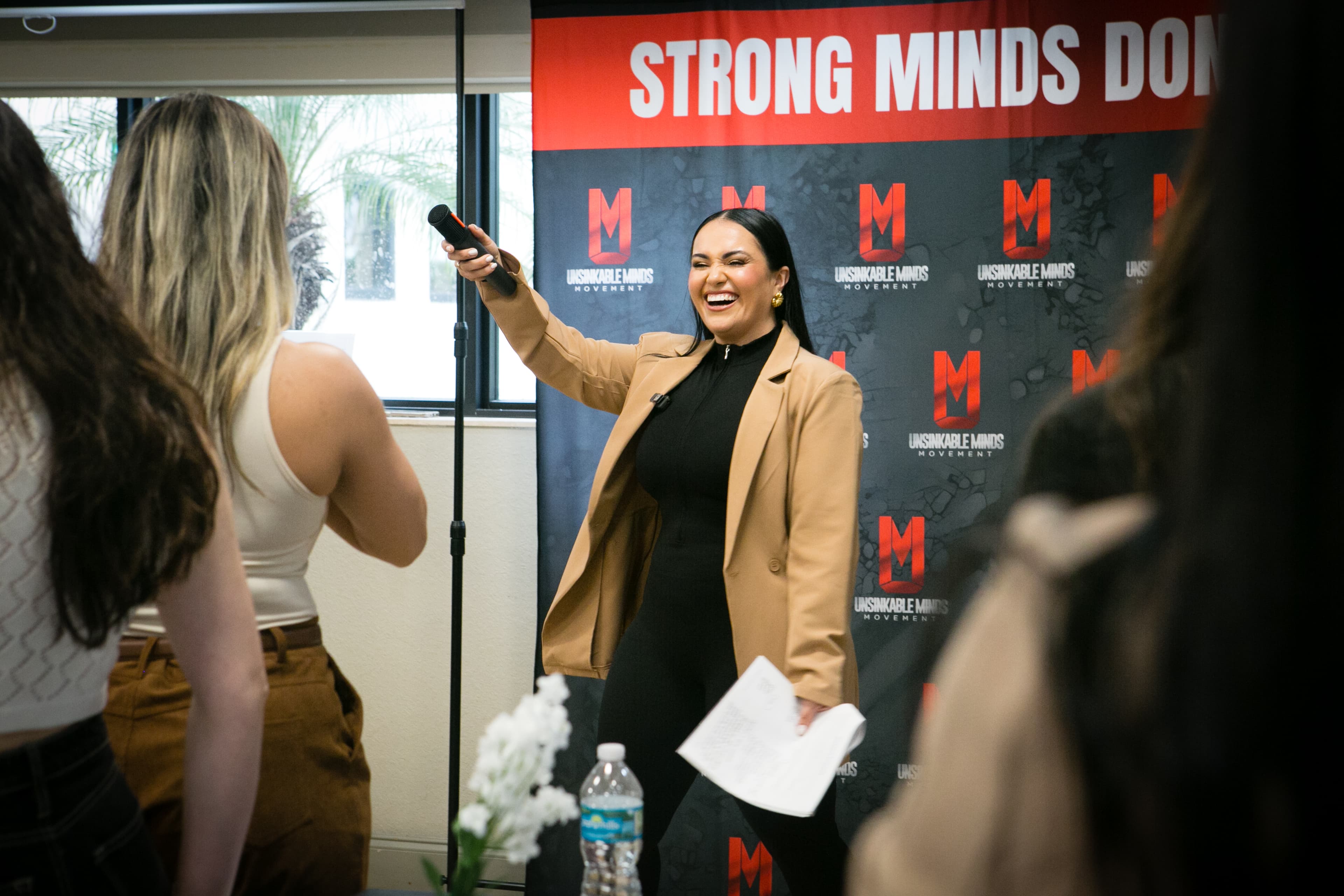 Dr. Gissele Donovan speaking at an Unsinkable Minds event